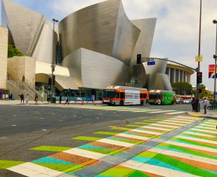 The Walt Disney Concert Hall and sidewalk art installation across from the Broad.